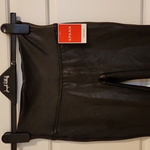 Spanx Faux leather tags on black leggings size small